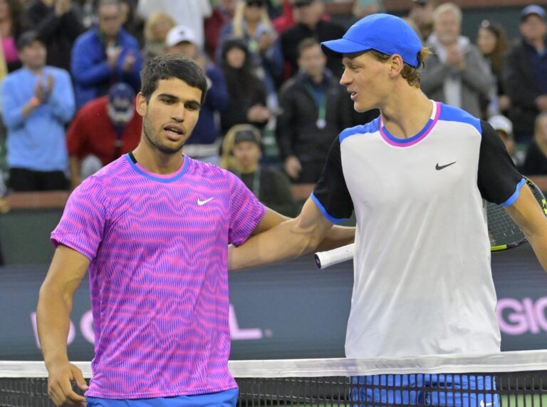 Carlos Alcaraz (ESP) is congratulated by Jannik Sinner (POL) after winning their semi-final match in the BNP Paribas Open at the Indian Wells Tennis Garden.