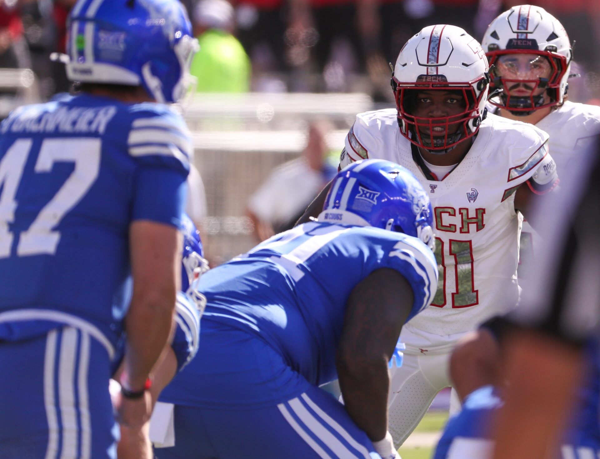 Texas Tech's David Bailey eyes BYU quarterback Bear Bachmeier before a snap in a Big 12 Conference football game, Saturday, Nov. 8, 2025, at Jones AT&T Stadium.