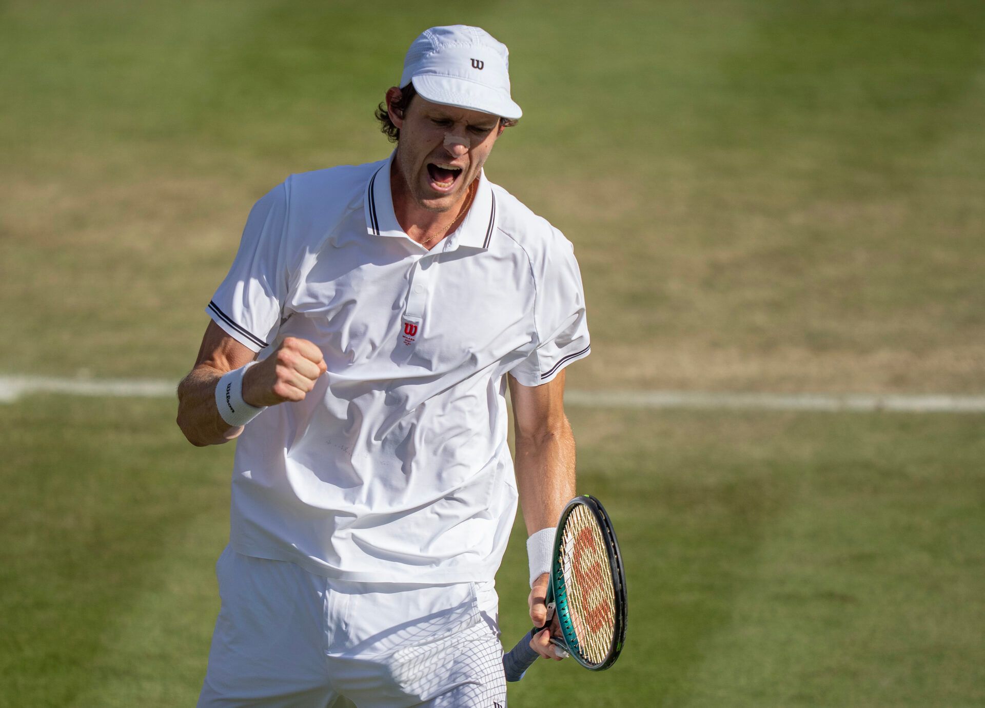 Nicolas Jarry of Chile returns a shot during his match against Joao Fonseca of Brazil on day five at the All England Lawn Tennis and Croquet Club.