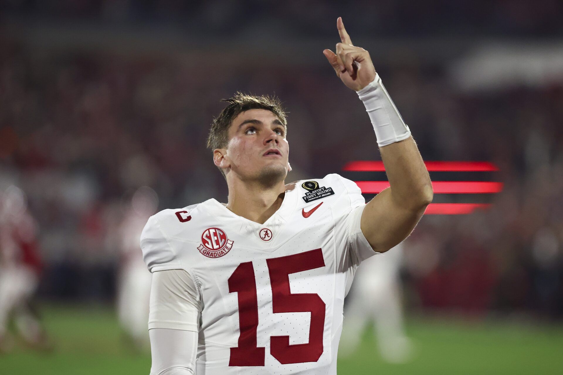 Alabama Crimson Tide quarterback Ty Simpson (15) gestures prior to a game against the Oklahoma Sooners at Gaylord Family OK Memorial Stadium.