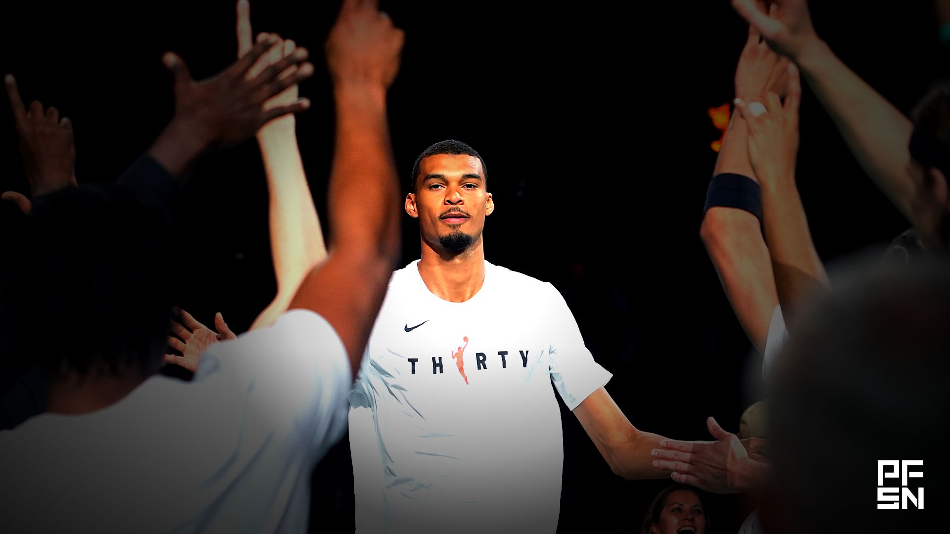 San Antonio Spurs forward Victor Wembanyama (1) is introduced as a starter before a game against the Dallas Mavericks at Frost Bank Center.