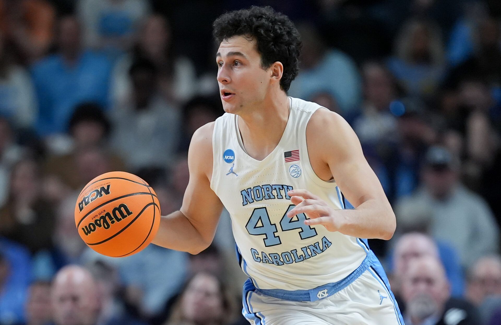 North Carolina Tar Heels guard Luka Bogavac (44) dribbles the ball against the VCU Rams in the first half of a first round game of the men's 2026 NCAA Tournament at Bon Secours Wellness Arena.