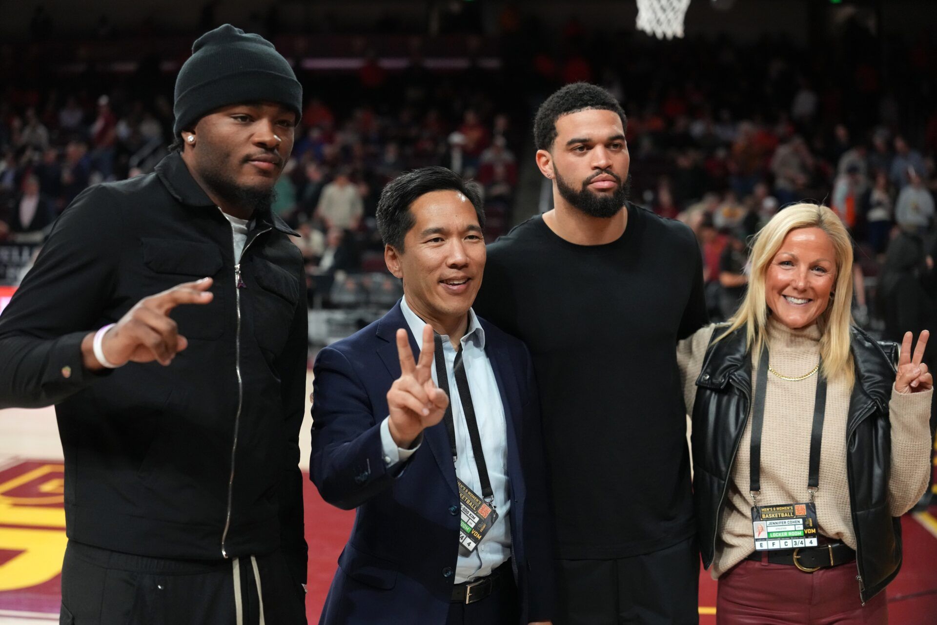 From left: Utah Jazz guard Isaiah Collier, Southern California Trojans president Beong-Soo Kim, Chicago Bears quarterback Caleb Williams and USC athletics director Jennifer Cohen pose at the Galen Center.