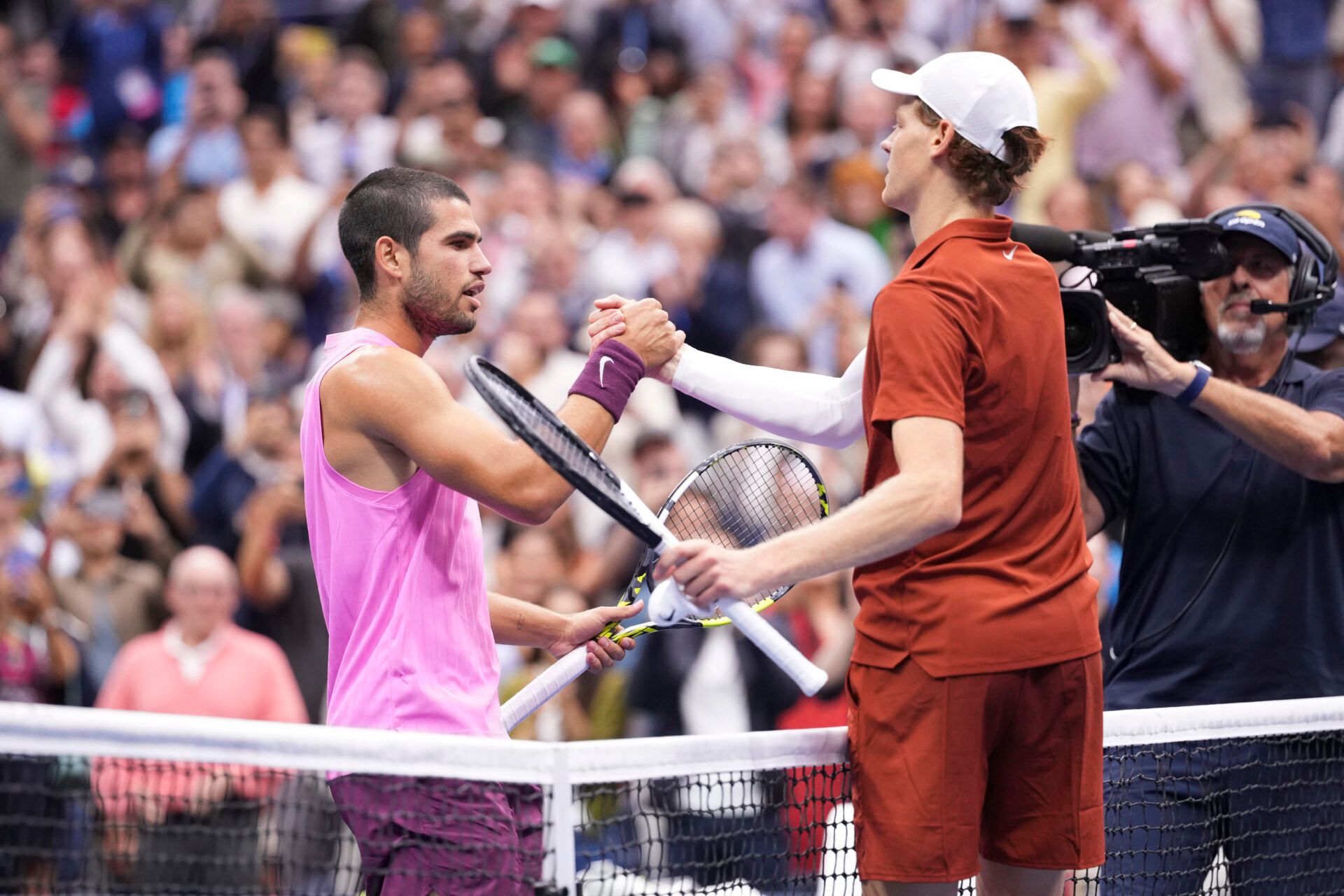 Carlos Alcaraz (ESP) shakes hands with Jannik Sinner (ITA) after the final of mens singles at Billie Jean King National Tennis Center.