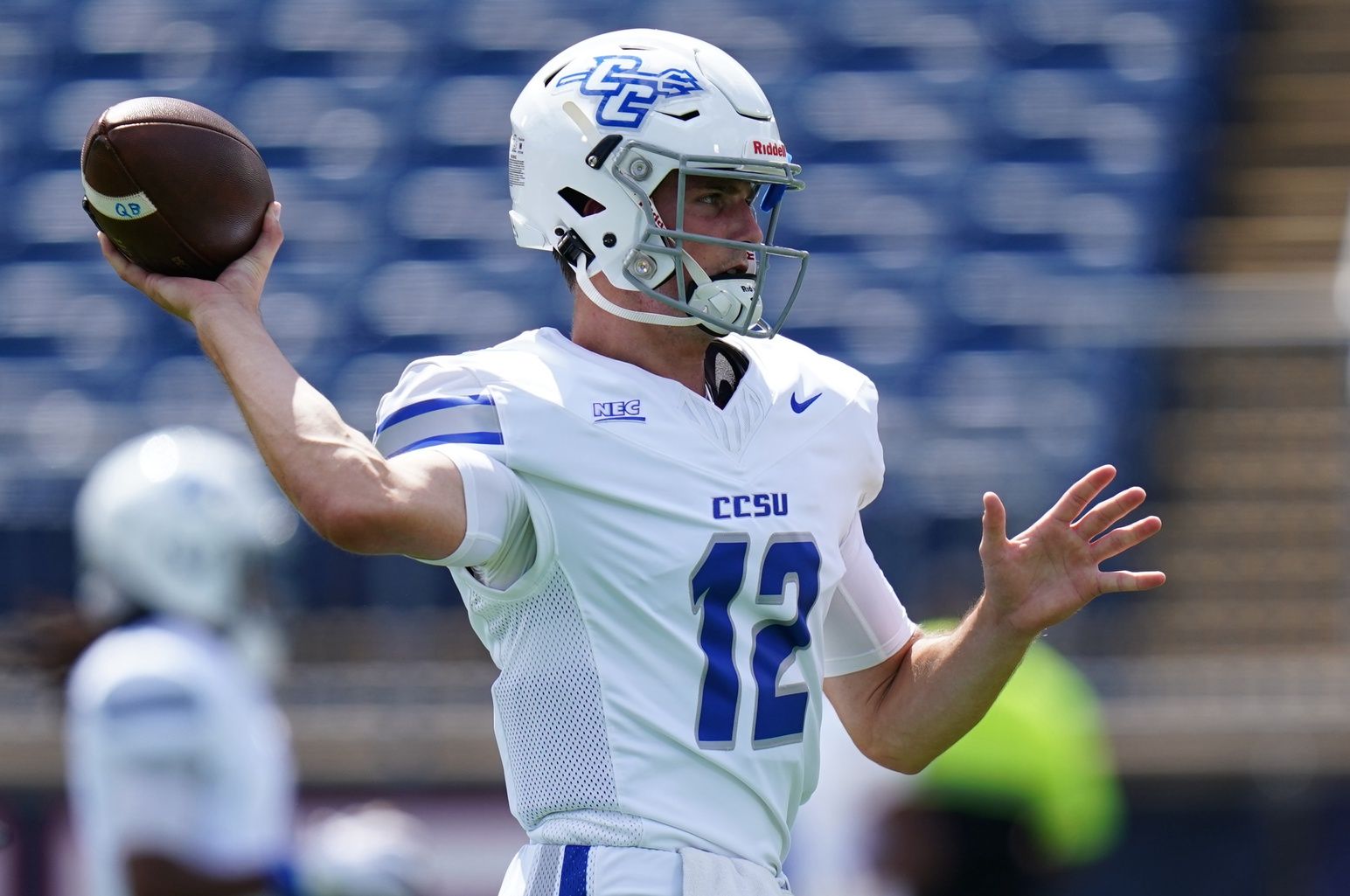 Central Connecticut State Blue Devils quarterback Brady Olson (12) warms up before the start of the game against the Connecticut Huskies at Pratt & Whitney Stadium at Rentschler Field.