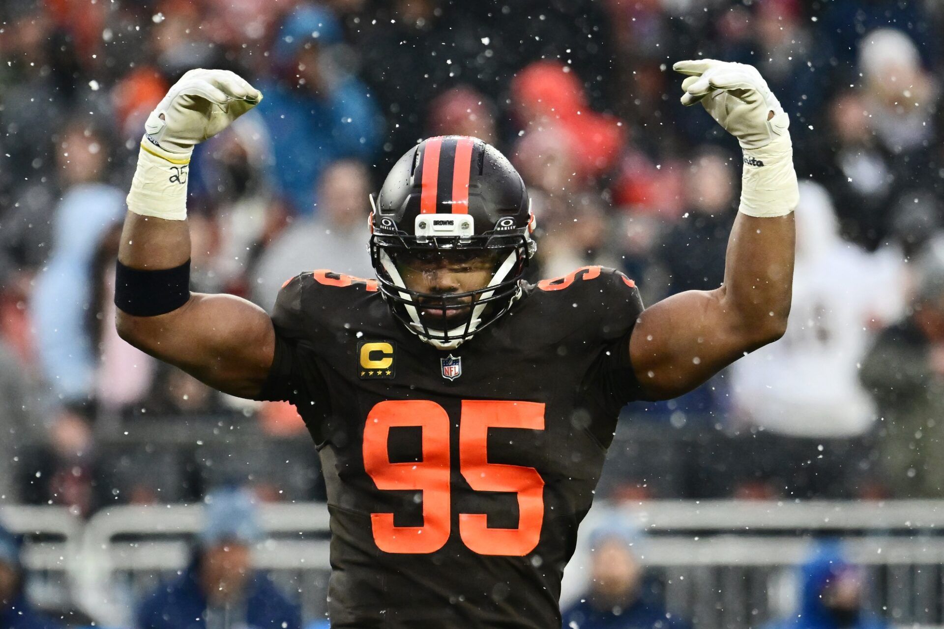 Cleveland Browns defensive end Myles Garrett (95) riles up the crowd against the Tennessee Titans during the fourth quarter at Huntington Bank Field.