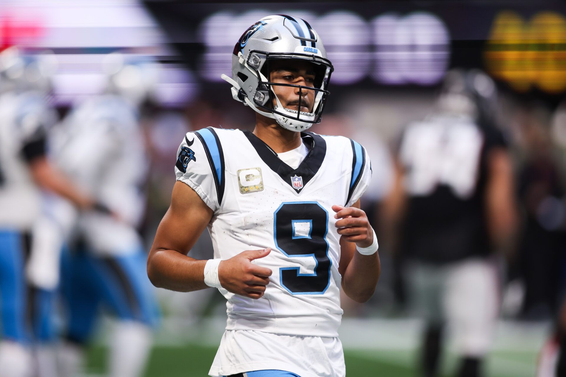 Carolina Panthers quarterback Bryce Young (9) runs off the field in the third quarter against the Atlanta Falcons at Mercedes-Benz Stadium.