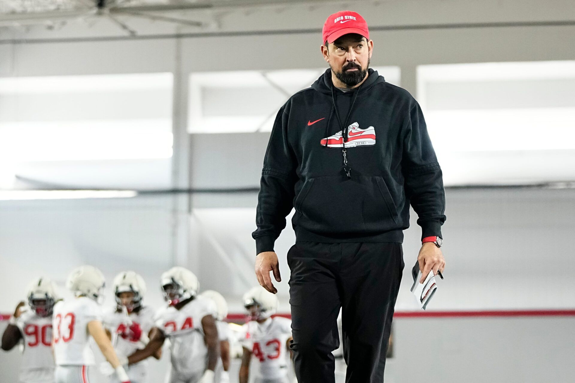 Ohio State Buckeyes head coach Ryan Day walks behind the huddle during Student Appreciation Day spring practice at the Woody Hayes Athletic Center on April 4, 2026.