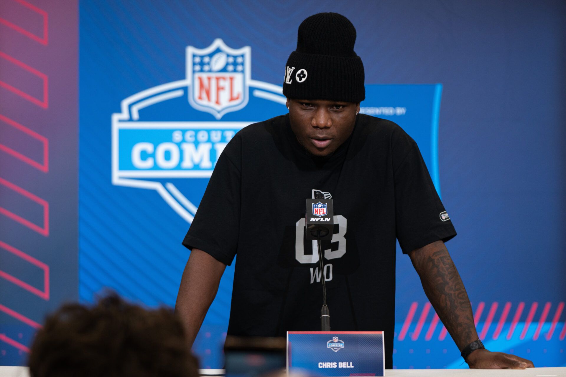 Louisville wideout Chris Bell (WO03) speaks to members of the media during the NFL Combine at the Indiana Convention Center.