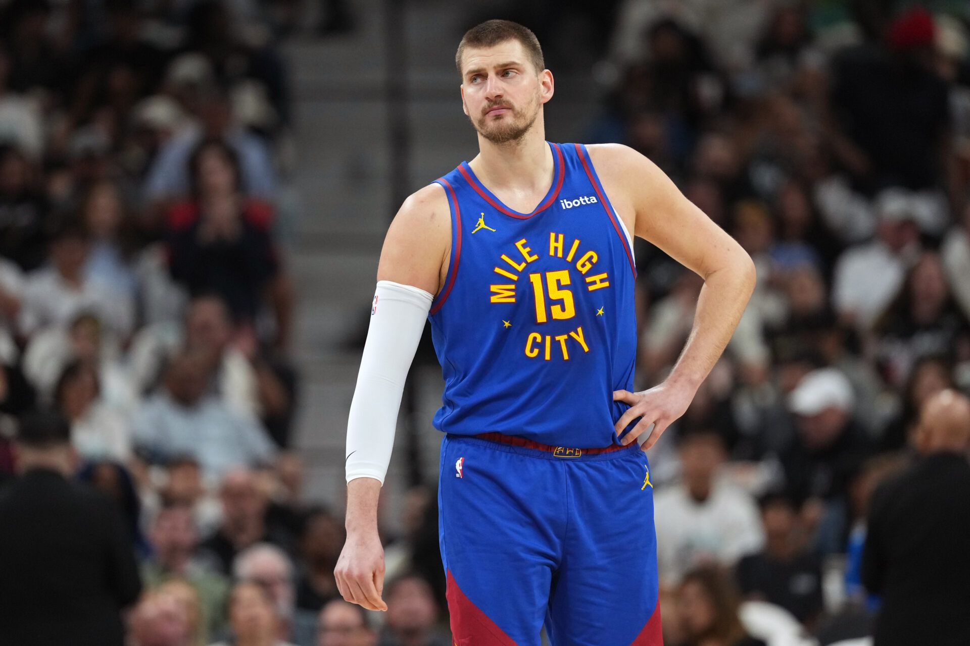 Denver Nuggets center Nikola Jokic (15) awaits the start of a game against the San Antonio Spurs at Frost Bank Center.
