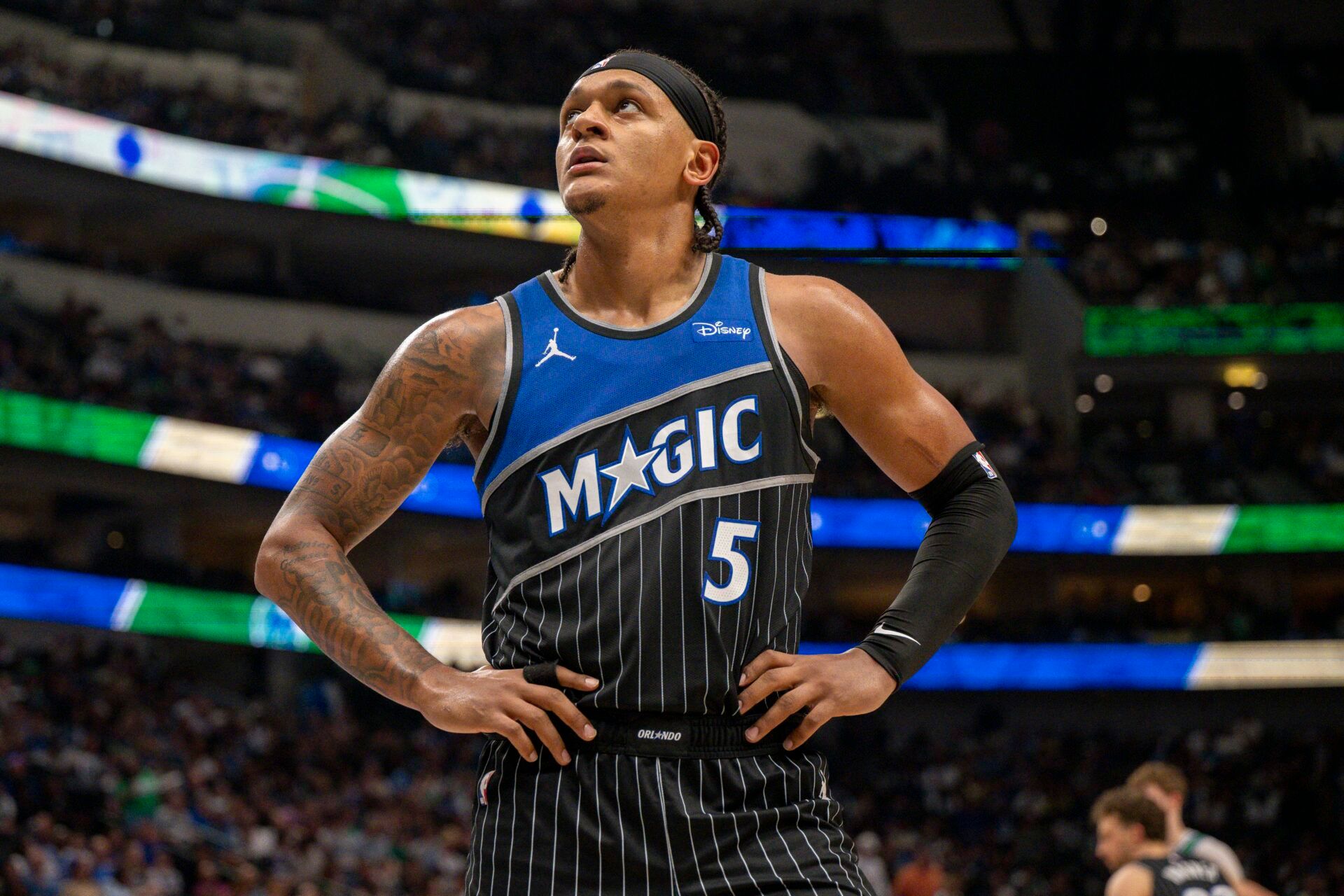 Orlando Magic forward Paolo Banchero (5) looks on during the game between the Mavericks and the Magic at American Airlines Center.