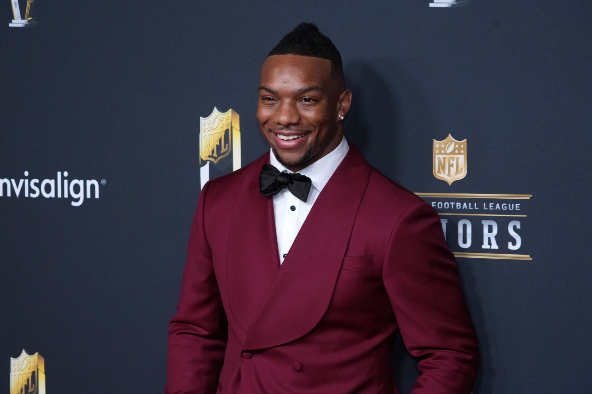 Bijan Robinson poses on the NFL Honors Red Carpet before Super Bowl LX at Palace of Fine Arts.