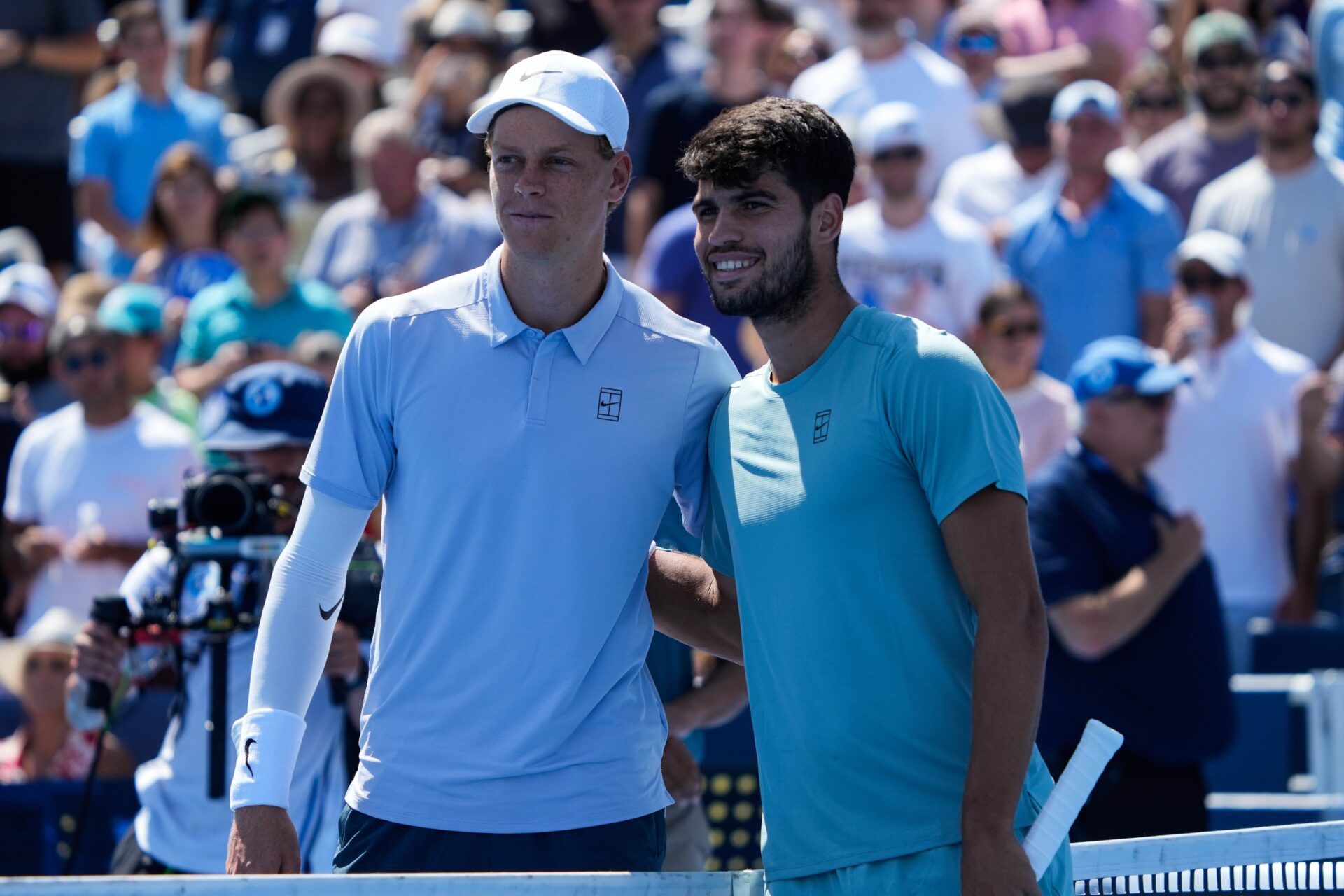 Jannik Sinner (left) and Carlos Alcaraz pose for a phot before their Men's Singles Finals match at the Cincinnati Open in Mason, Ohio on Monday August 18, 2025. Sinner retired due to illness after losing five games to Alcaraz.