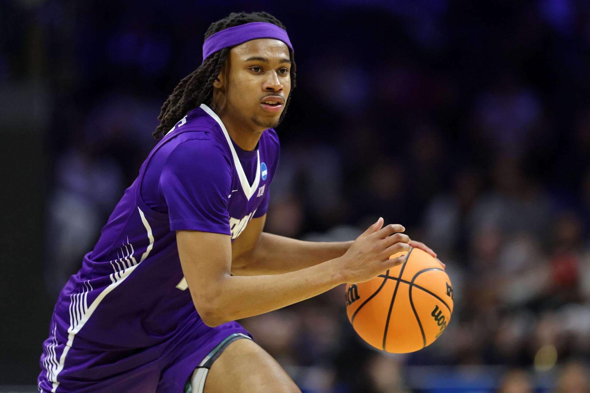 Furman Paladins guard Alex Wilkins (10) dribbles the ball against the UConn Huskies in the second half during a first round game of the men's 2026 NCAA Tournament at Xfinity Mobile Arena.