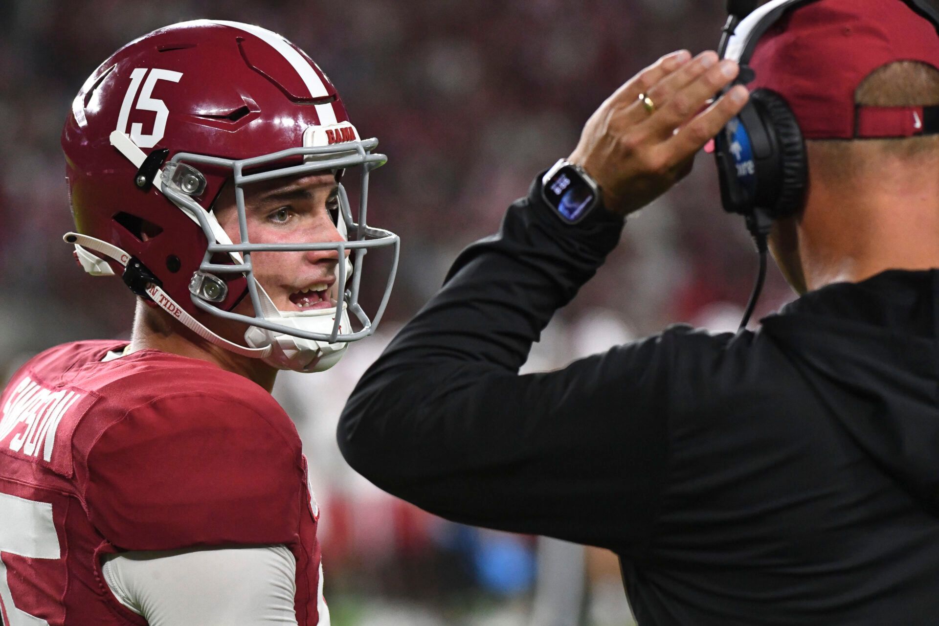 Alabama Crimson Tide quarterback Ty Simpson (15) talks with Alabama Crimson Tide head coach Kalen DeBoer  at Bryant-Denny Stadium during the game between the Alabama Crimson Tide and the Western Kentucky Hilltoppers. Alabama defeated Western Kentucky 63-0.