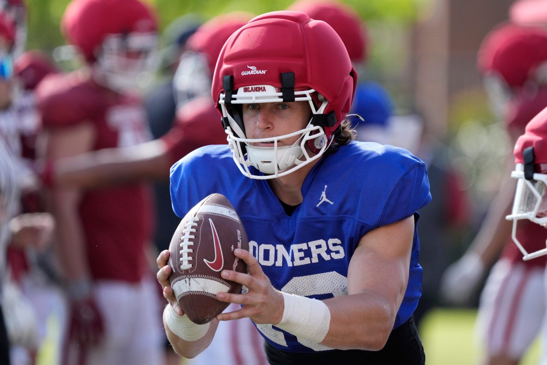 Oklahoma's John Mateer runs a drill during a Sooners football spring practice in Norman, Okla., Thursday, April 9, 2026.