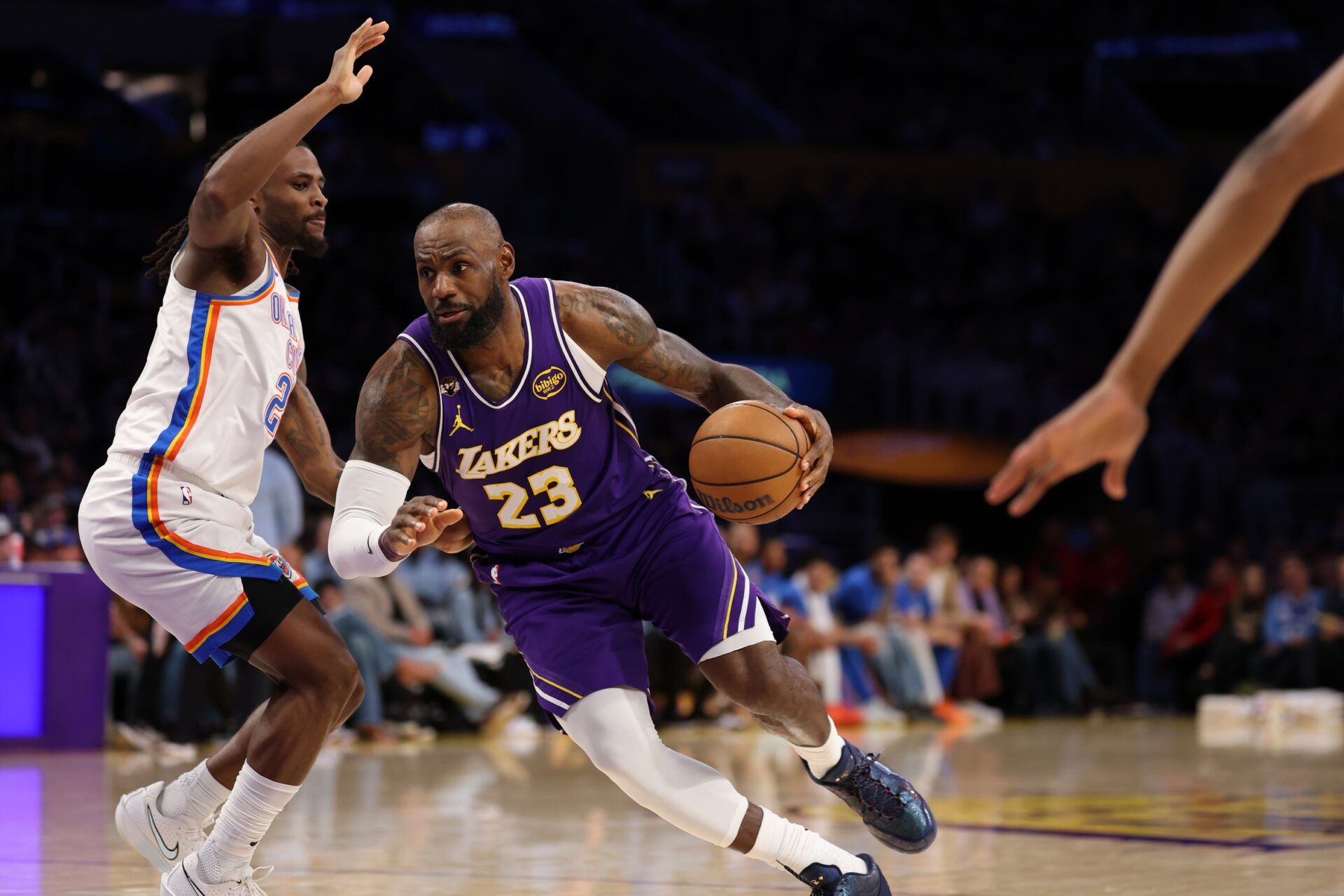Los Angeles Lakers forward LeBron James (23) drives to the basket against Oklahoma City Thunder guard Cason Wallace (22) during the third quarter at Crypto.com Arena.