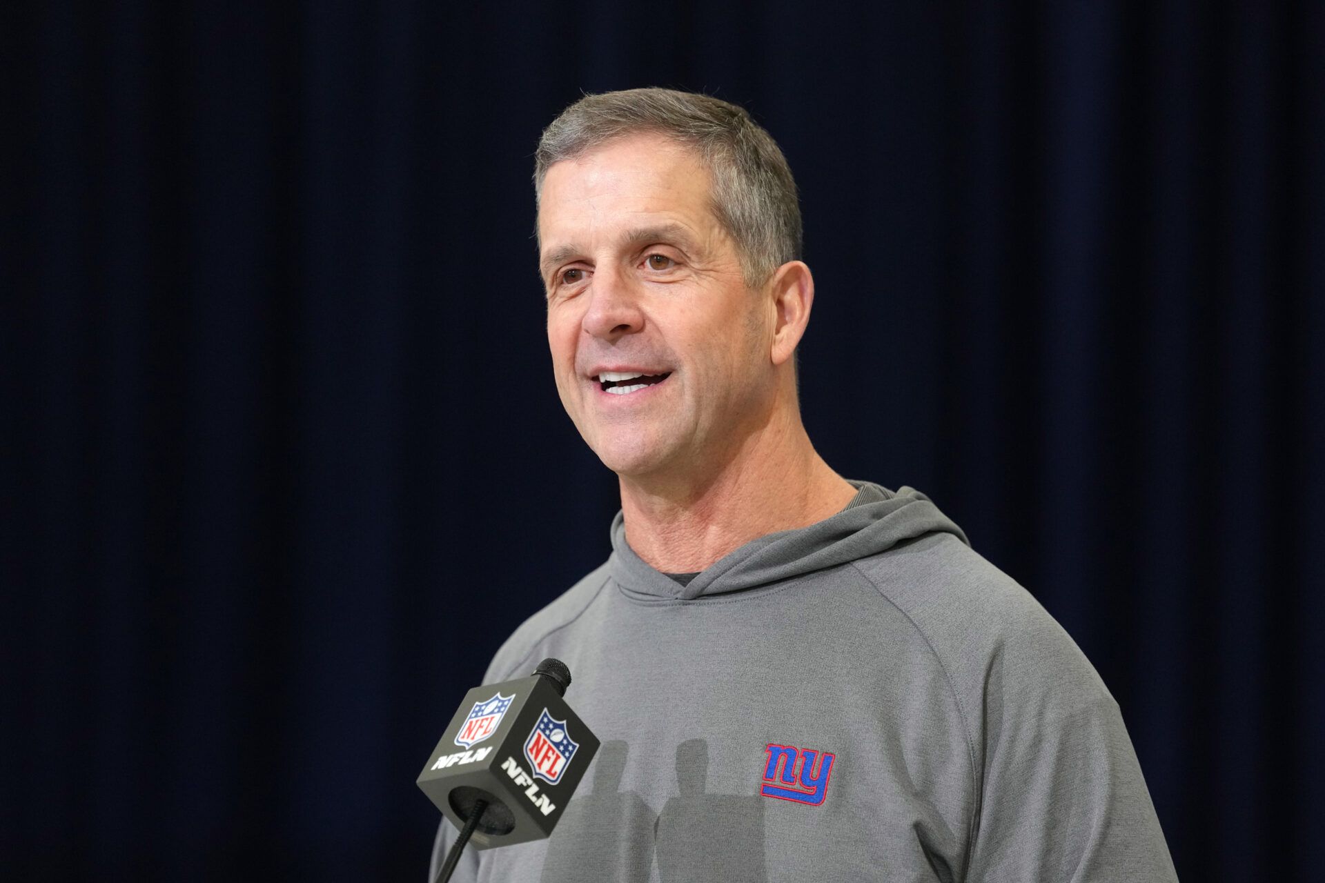 New York Giants coach John Harbaugh speaks at the NFL Scouting Combine at the Indiana Convention Center.