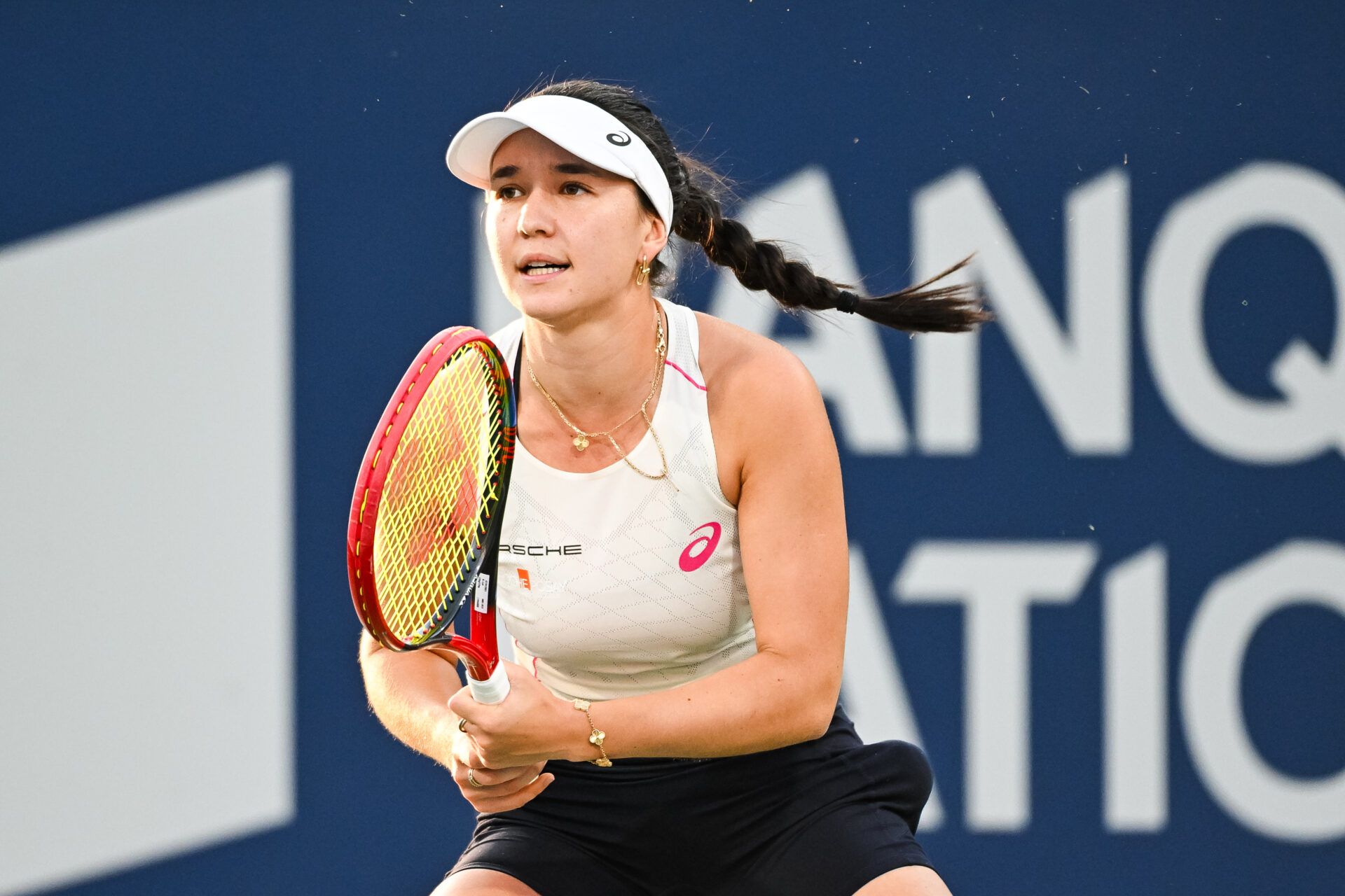 Eva Lys (GER) tracks her shot against Iga Swiatek (POL) in third round play at IGA Stadium.