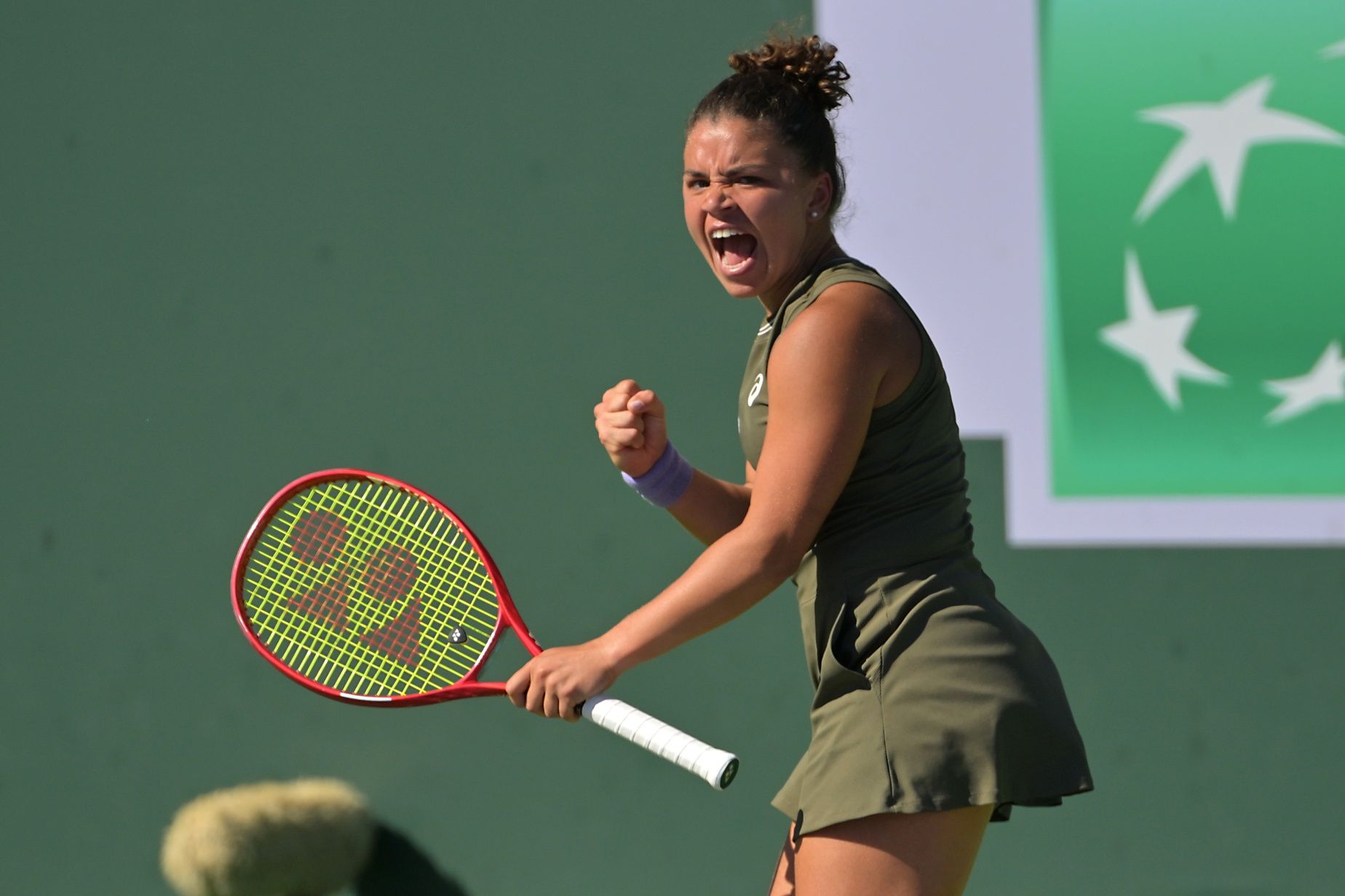 Jasmine Paolini (ITA) reacts after winning the second set during her third round match against Ajla Tomljanovic (AUS) in the BNP Paribas Open at the Indian Wells Tennis Garden.