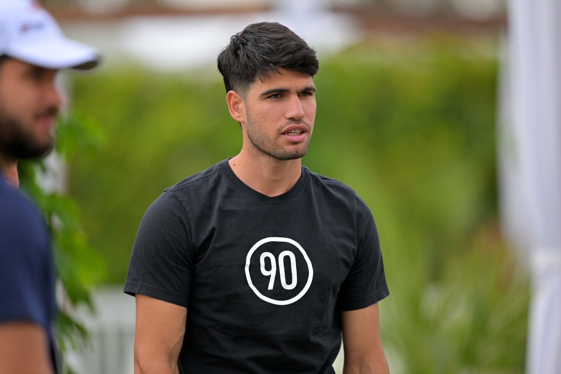 Carlos Alcaraz (ESP) warms up before hitting on the practice courts for the BNP Paribas Open at the Indian Wells Tennis Garden.