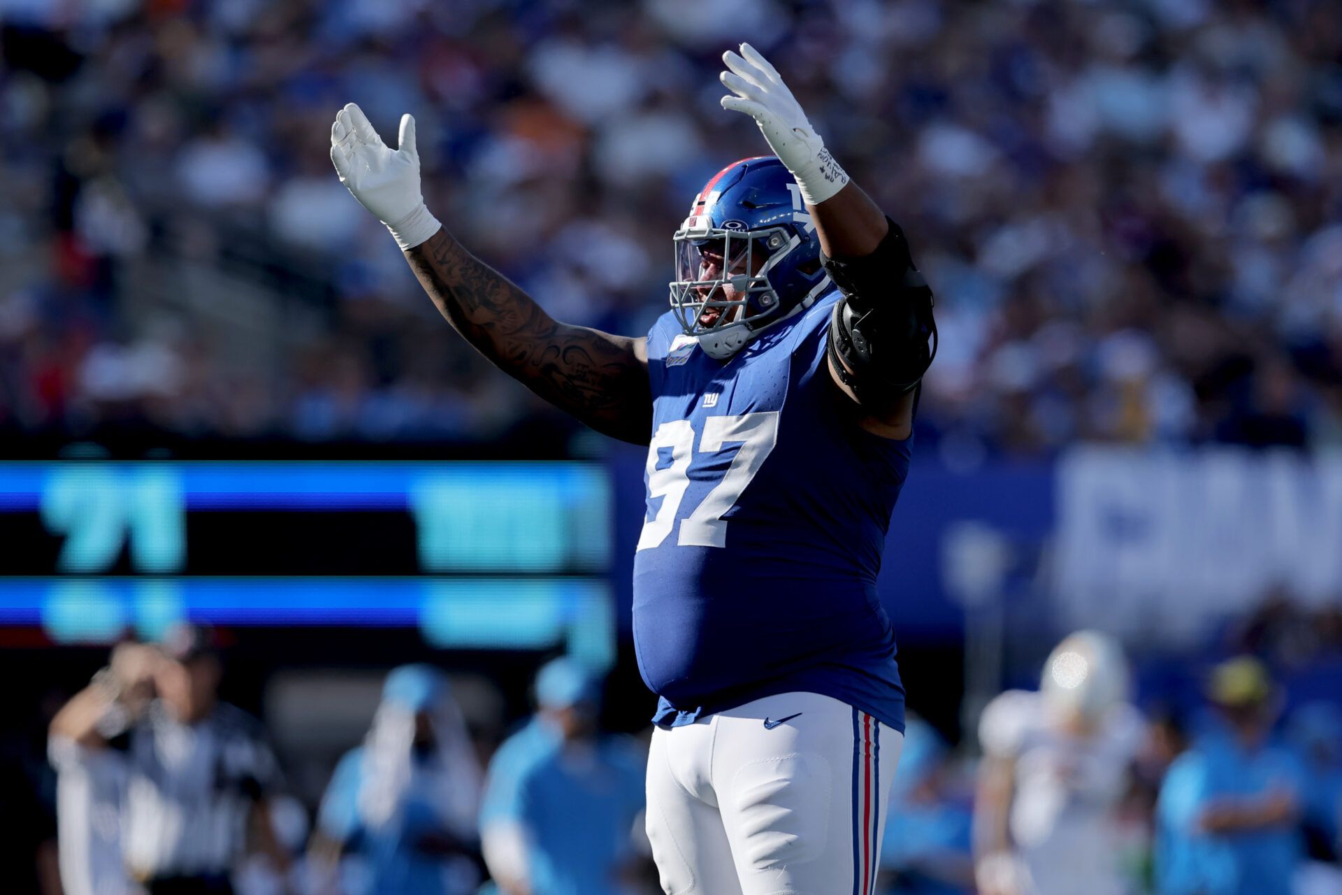 New York Giants defensive tackle Dexter Lawrence (97) reacts during the fourth quarter against the Los Angeles Chargers at MetLife Stadium.