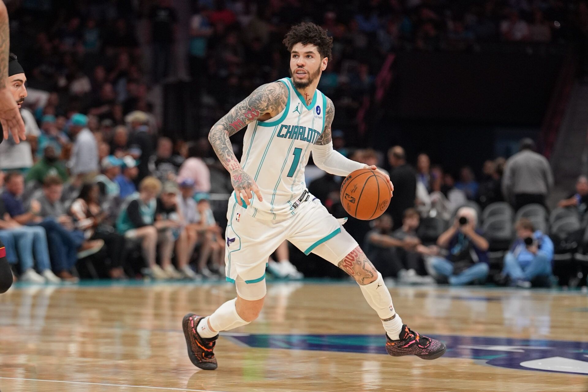 Charlotte Hornets guard LaMelo Ball (1) moves the ball during the second half during the play-in rounds between the Charlotte Hornets and the Miami Heat of the 2026 NBA Playoffs at Spectrum Center.