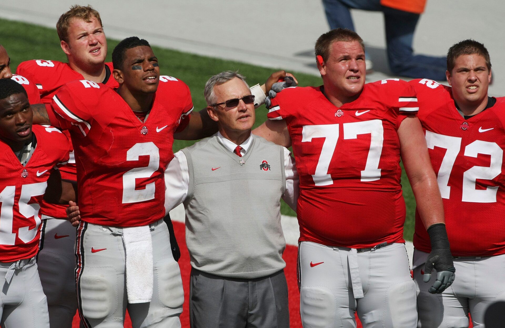 Ohio State football coach Jim Tressel, Ohio State quarterback Terrelle Pryor (2), Ohio State offensive linesman Connor Smith (77) and Ohio State offensive linesman Scott Sika (72) sing Carmen Ohio after beating Ohio University during the second half of their NCAA football game at Ohio Stadium on September 18, 2010. (The Columbus Dispatch photo by Neal C. Lauron)