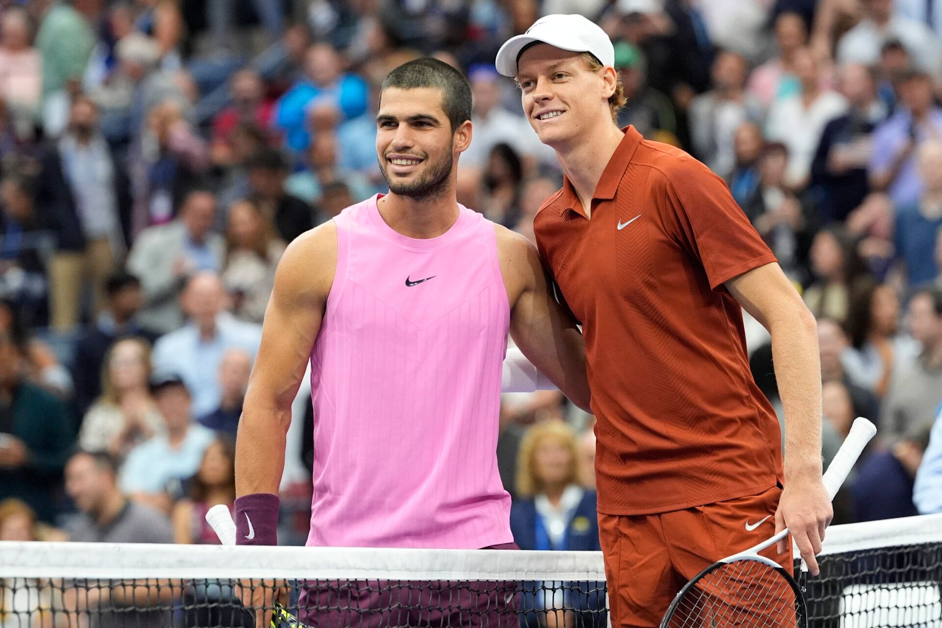 Carlos Alcaraz (ESP) and Jannik Sinner (ITA) pose for a photos a the net prior to the final of mens singles at Billie Jean King National Tennis Center.