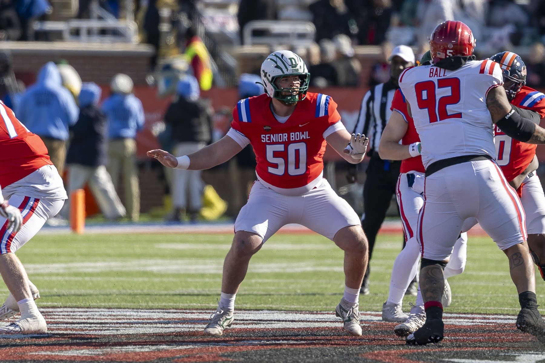 National offensive lineman Delby Lemieux (50) of Dartmouth sets up to block during the first half of the 2026 Senior Bowl at University of South Alabama, Hancock Whitney Stadium.