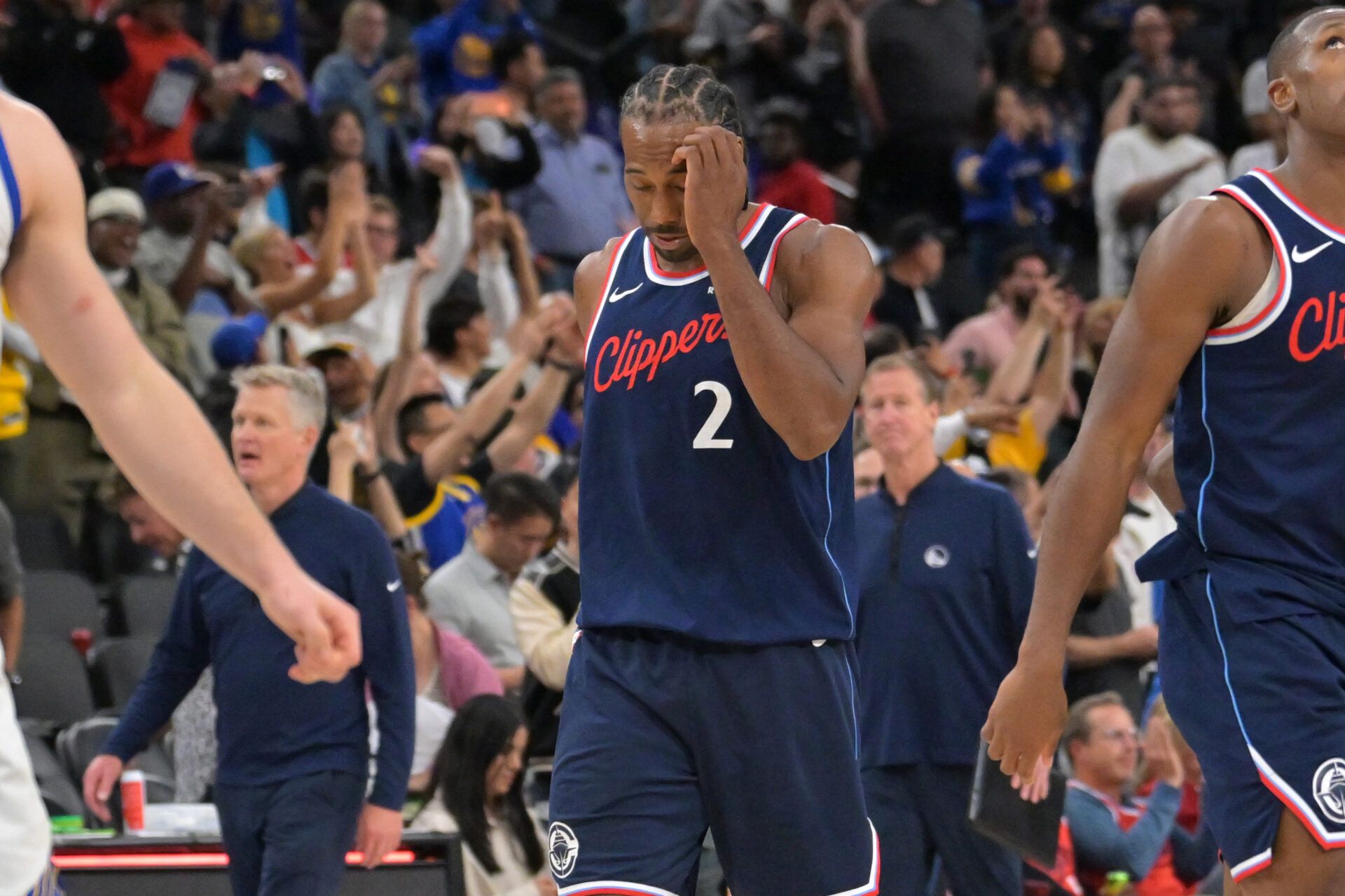 Los Angeles Clippers forward Kawhi Leonard (2) leaves the court after being defeated by the Golden State Warriors during the play-in rounds of the 2026 NBA Playoffs at Intuit Dome.