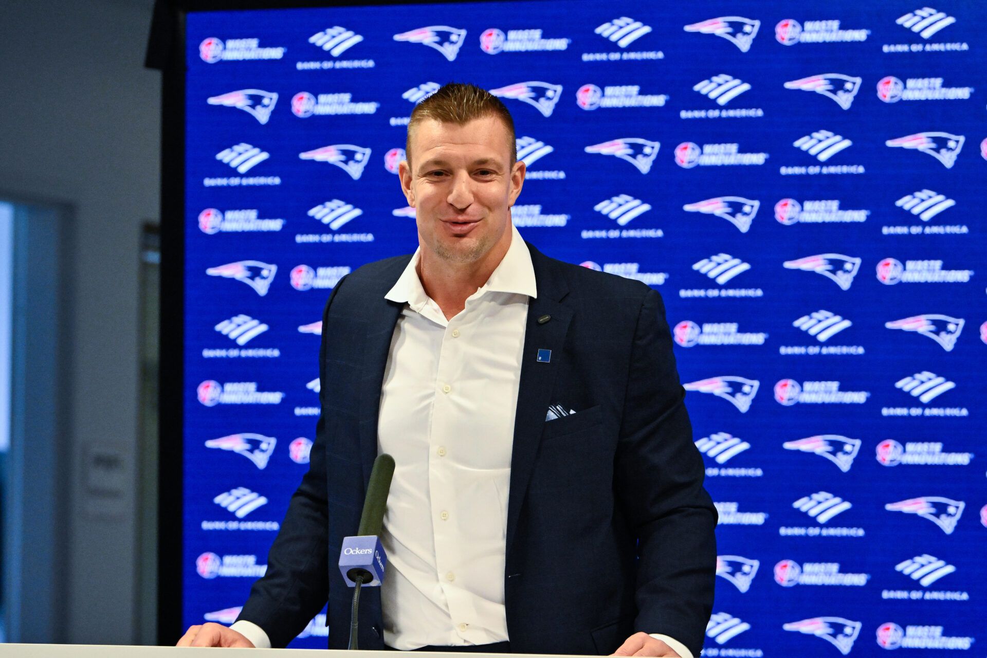 New England Patriots former player and current Fox Sports football analyst Rob Gronkowski speaks during a press conference where he signed a ceremonial one day contract at Gillette Stadium.