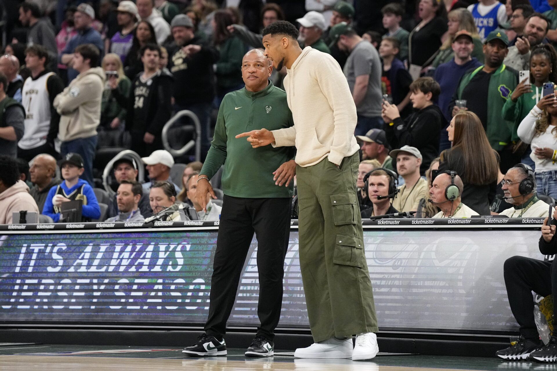 Milwaukee Bucks head coach Doc Rivers talks with forward Giannis Antetokounmpo (34) during the fourth quarter against the Brooklyn Nets at Fiserv Forum.
