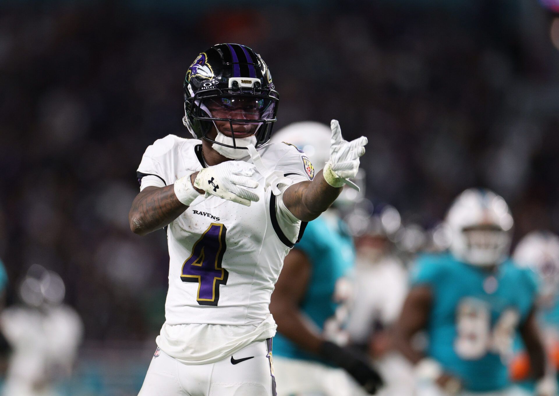 Baltimore Ravens wide receiver Zay Flowers (4) reacts after a runs for a gain during the third quarter against the Miami Dolphins at Hard Rock Stadium.