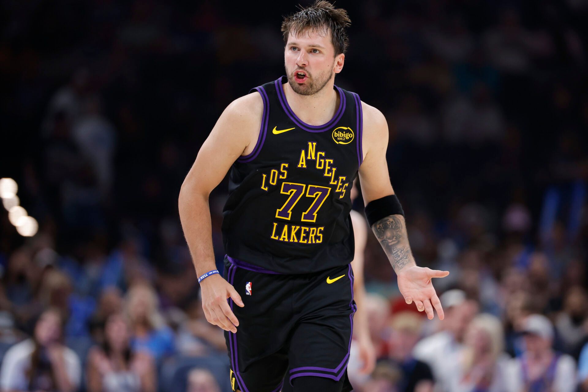 Los Angeles Lakers guard Luka Doncic (77) reacts after a play against the Oklahoma City Thunder during the second half at Paycom Center.