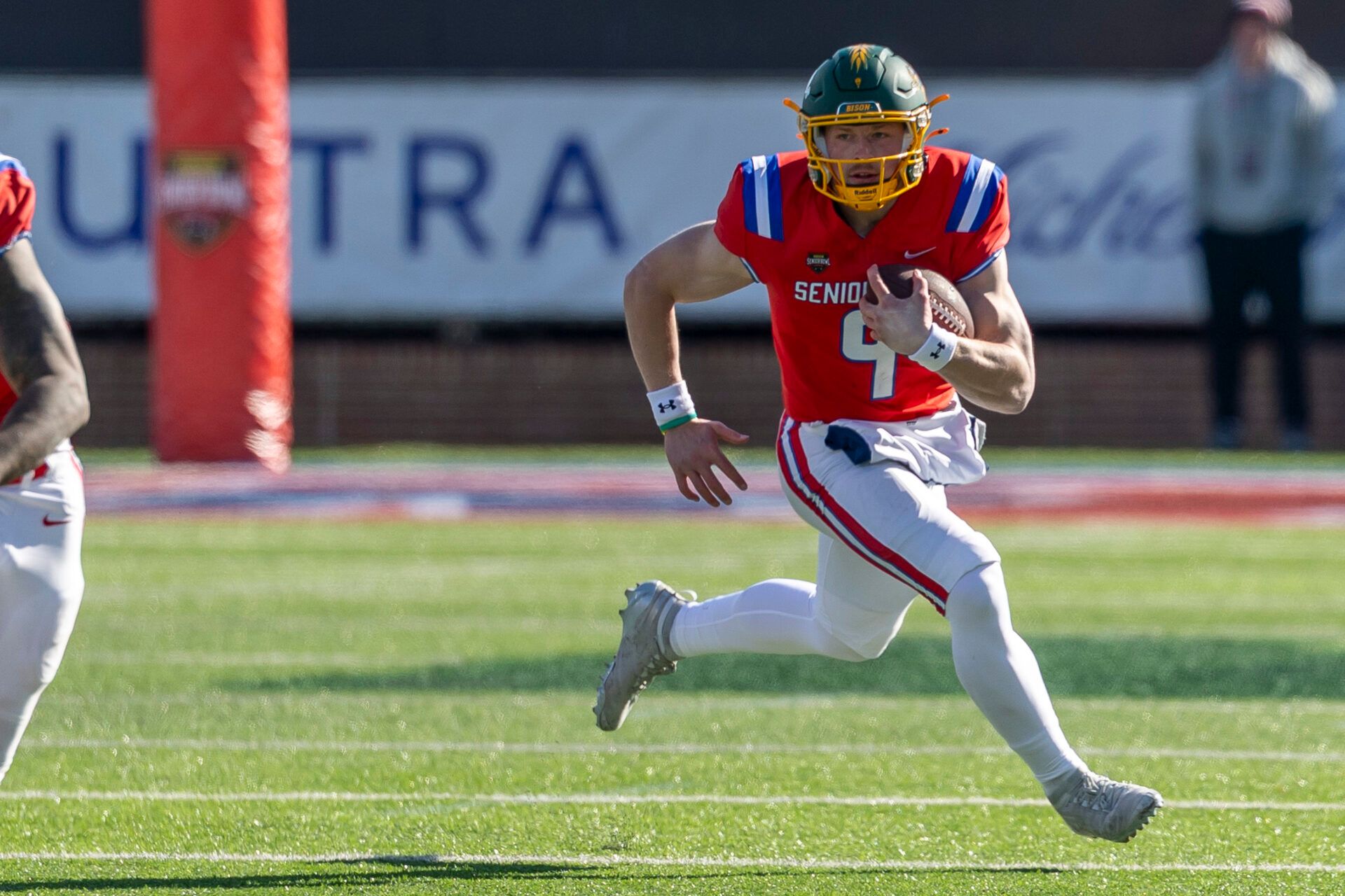 National quarterback Cole Payton (9) of North Dakota State runs the ball during the first half of the 2026 Senior Bowl at University of South Alabama, Hancock Whitney Stadium.
