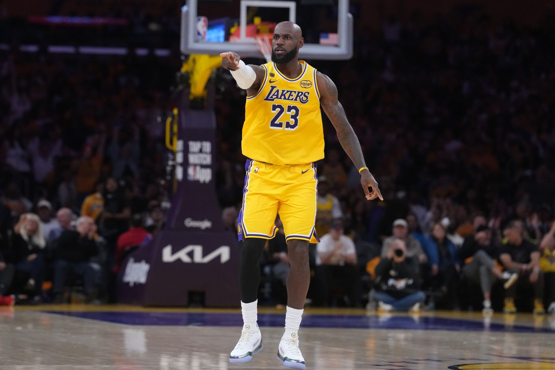 Los Angeles Lakers forward LeBron James (23) gestures against the Houston Rockets in the first half during game one of the first round of the 2026 NBA Playoffs at Crypto.com Arena.