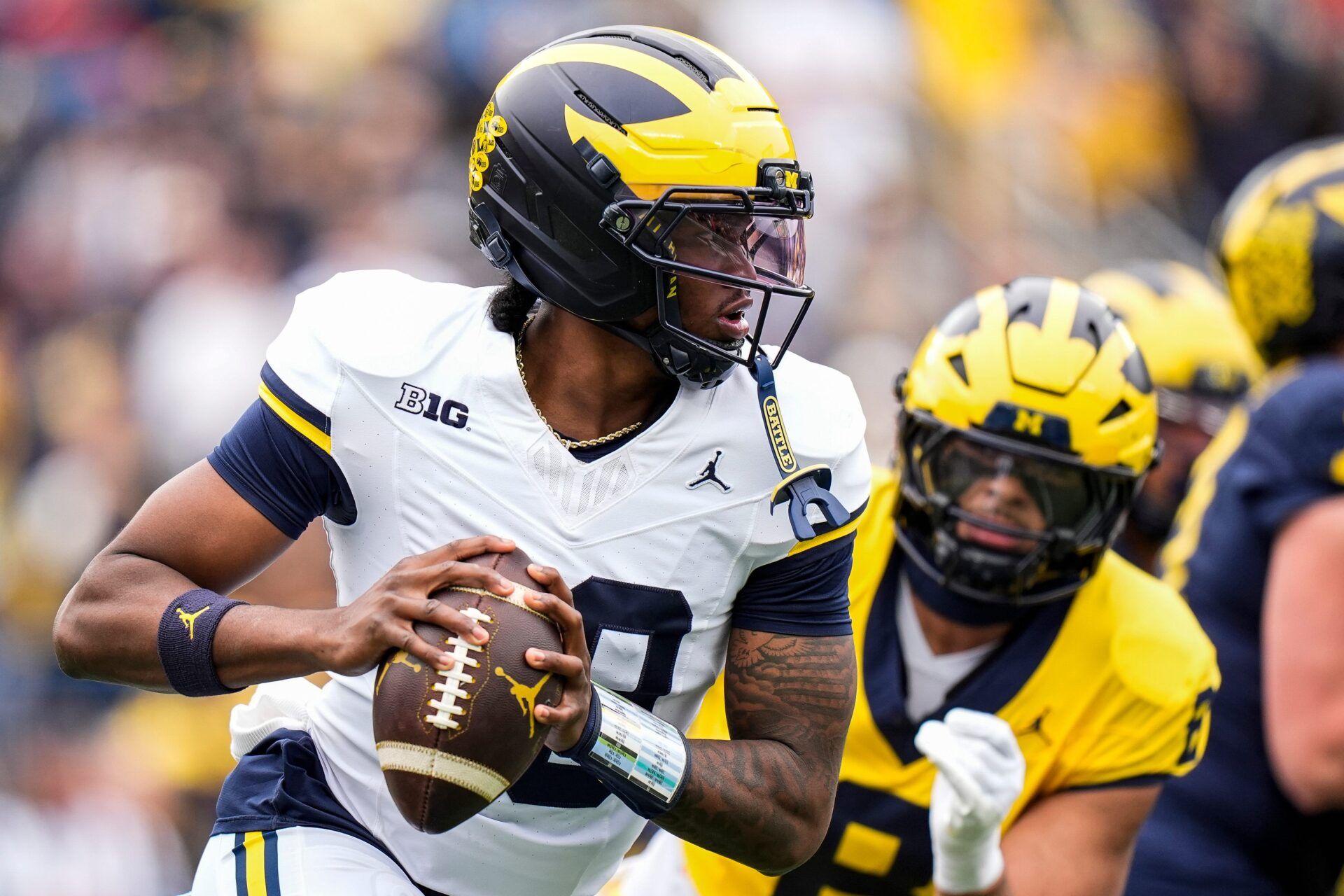 Michigan quarterback Bryce Underwood (19) looks to pass the ball during the spring game at Michigan Stadium in Ann Arbor on Saturday, April 18, 2026.