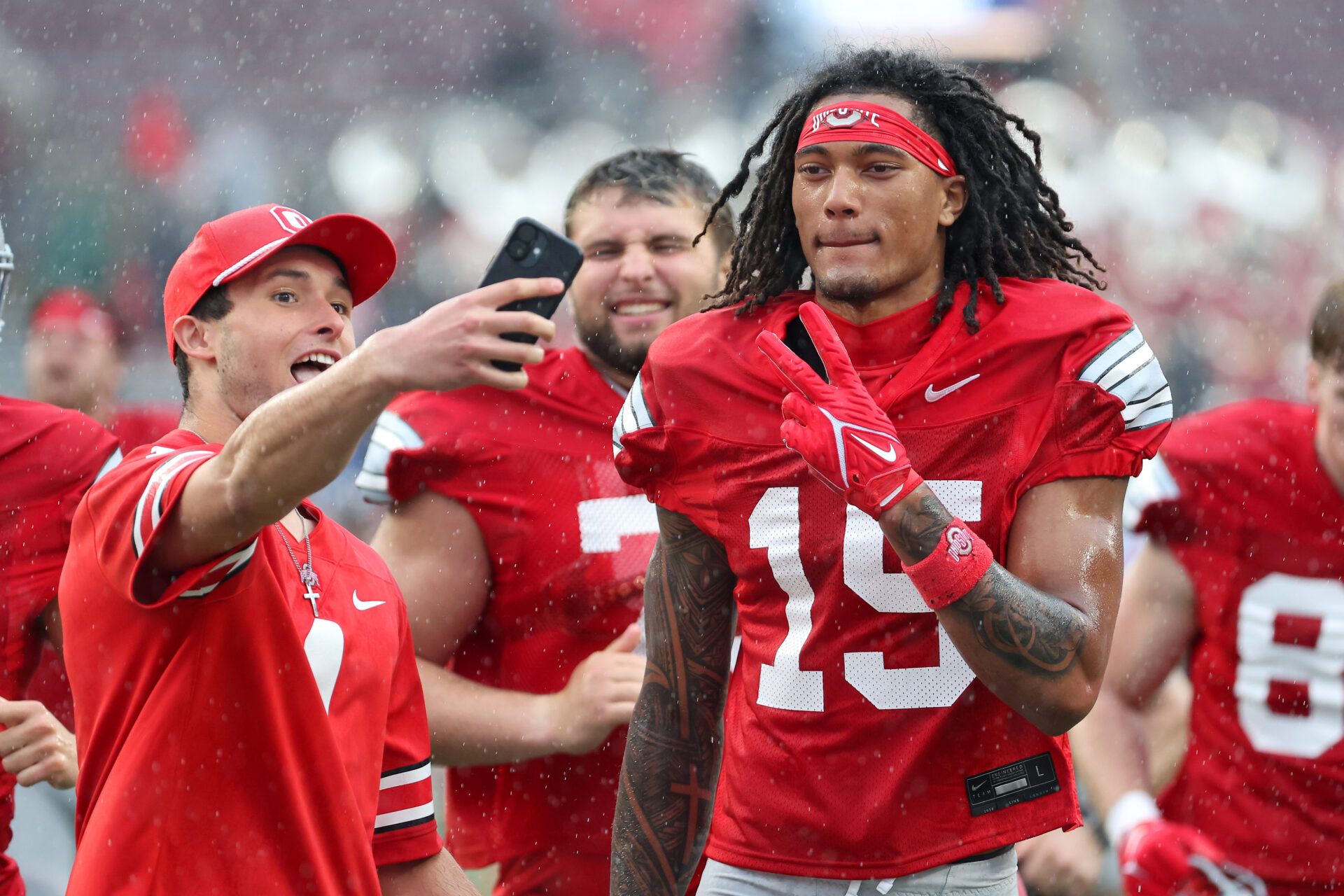 Ohio State wide receiver Chris Henry Jr. (15) greets a fan following the second half as part of the annual spring game at Ohio Stadium.