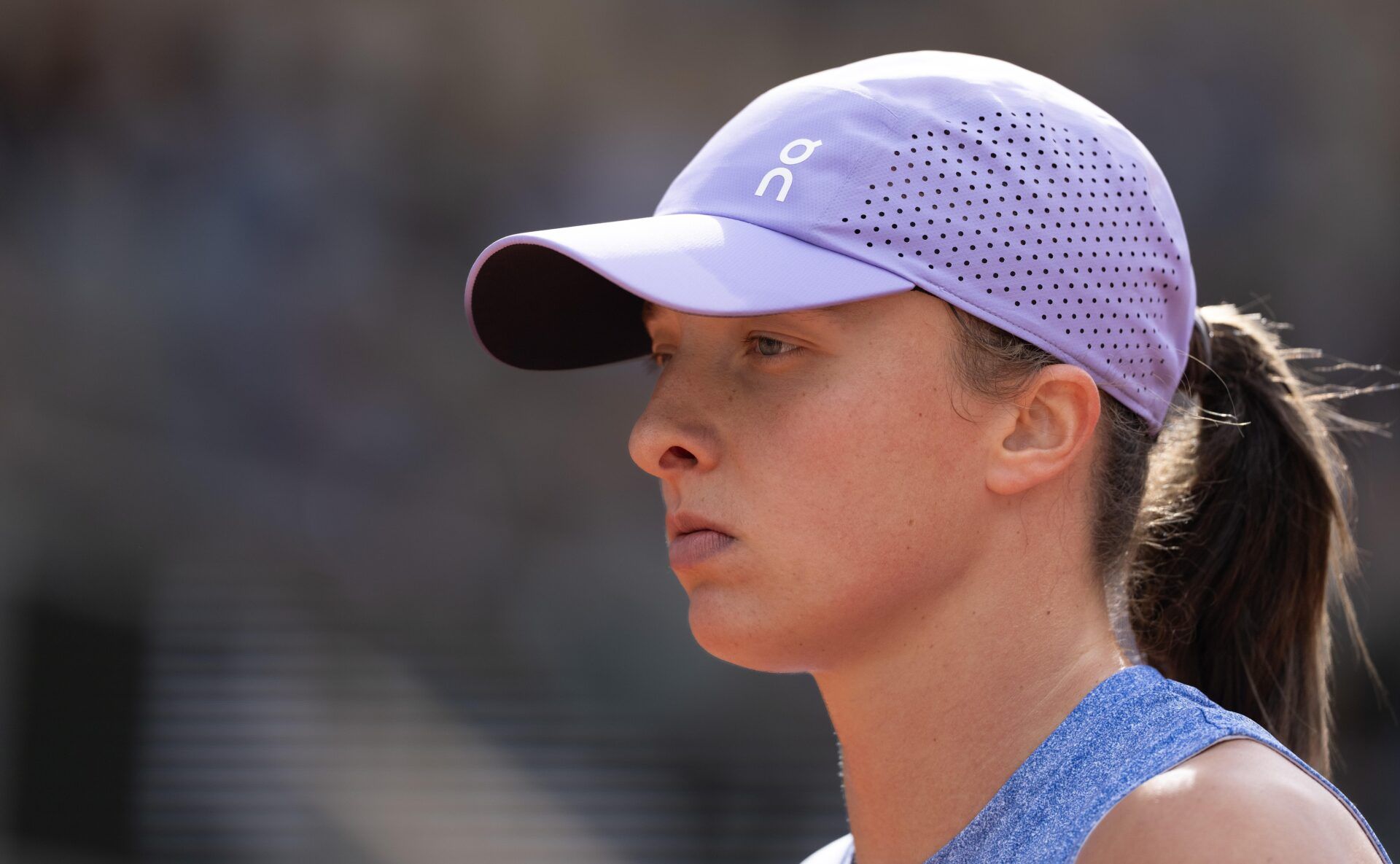 Iga Swiatek of Poland during her match against Emma Raducanu of Great Britain on day four at Roland Garros Stadium.