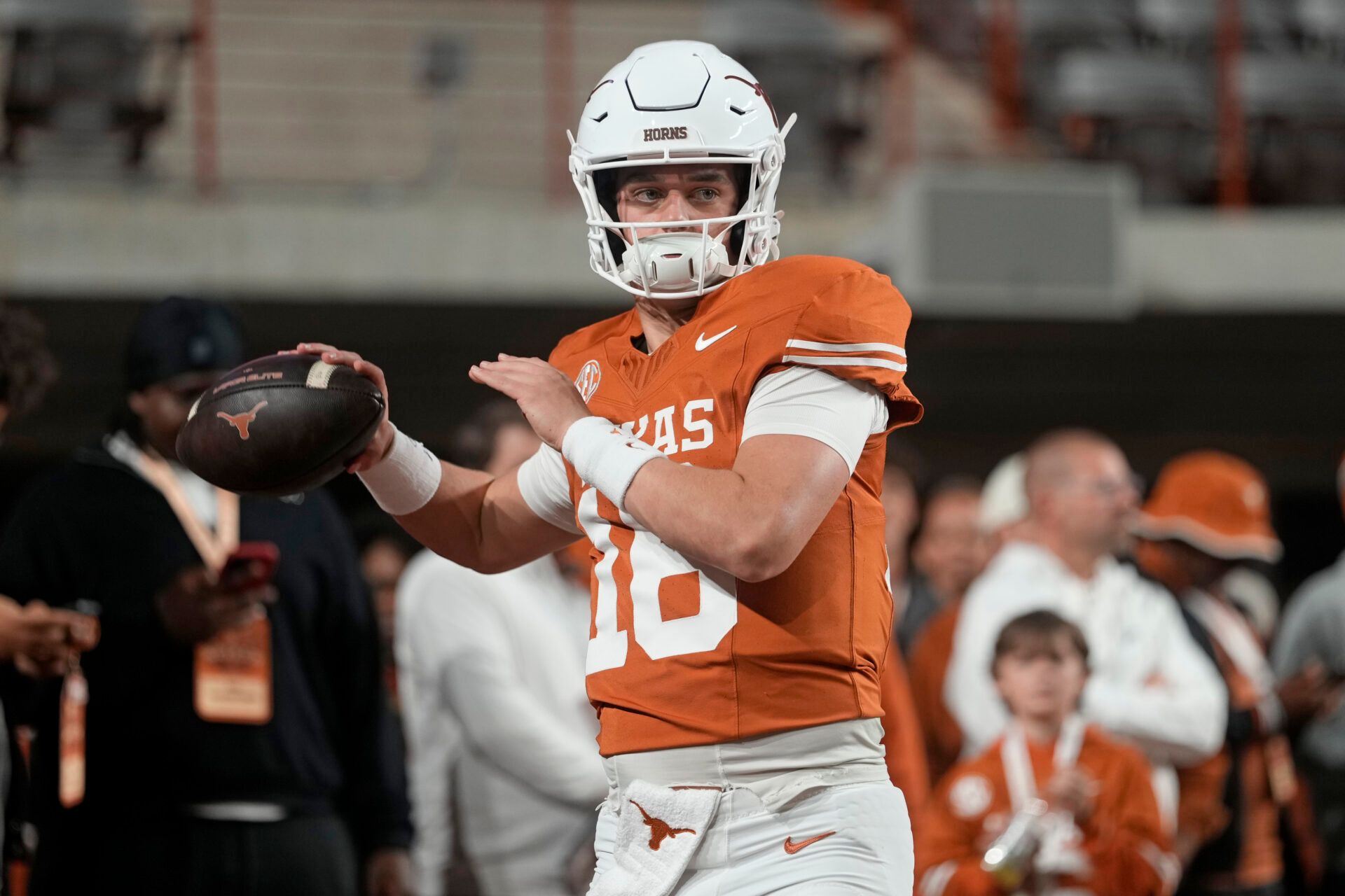 Texas Longhorns quarterback Arch Manning warms up before a game against the Texas A&M Aggies at Darrell K Royal-Texas Memorial Stadium.