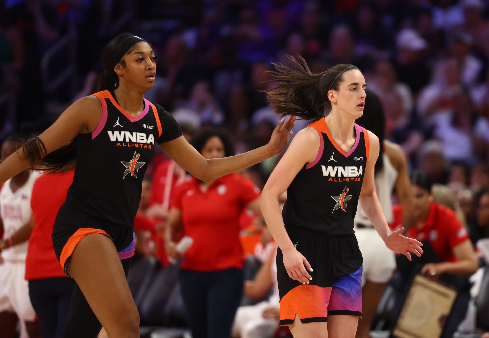 Team WNBA guard Caitlin Clark (right) and Angel Reese against the USA Women's National Team during the 2024 WNBA All Star Game at Footprint Center.