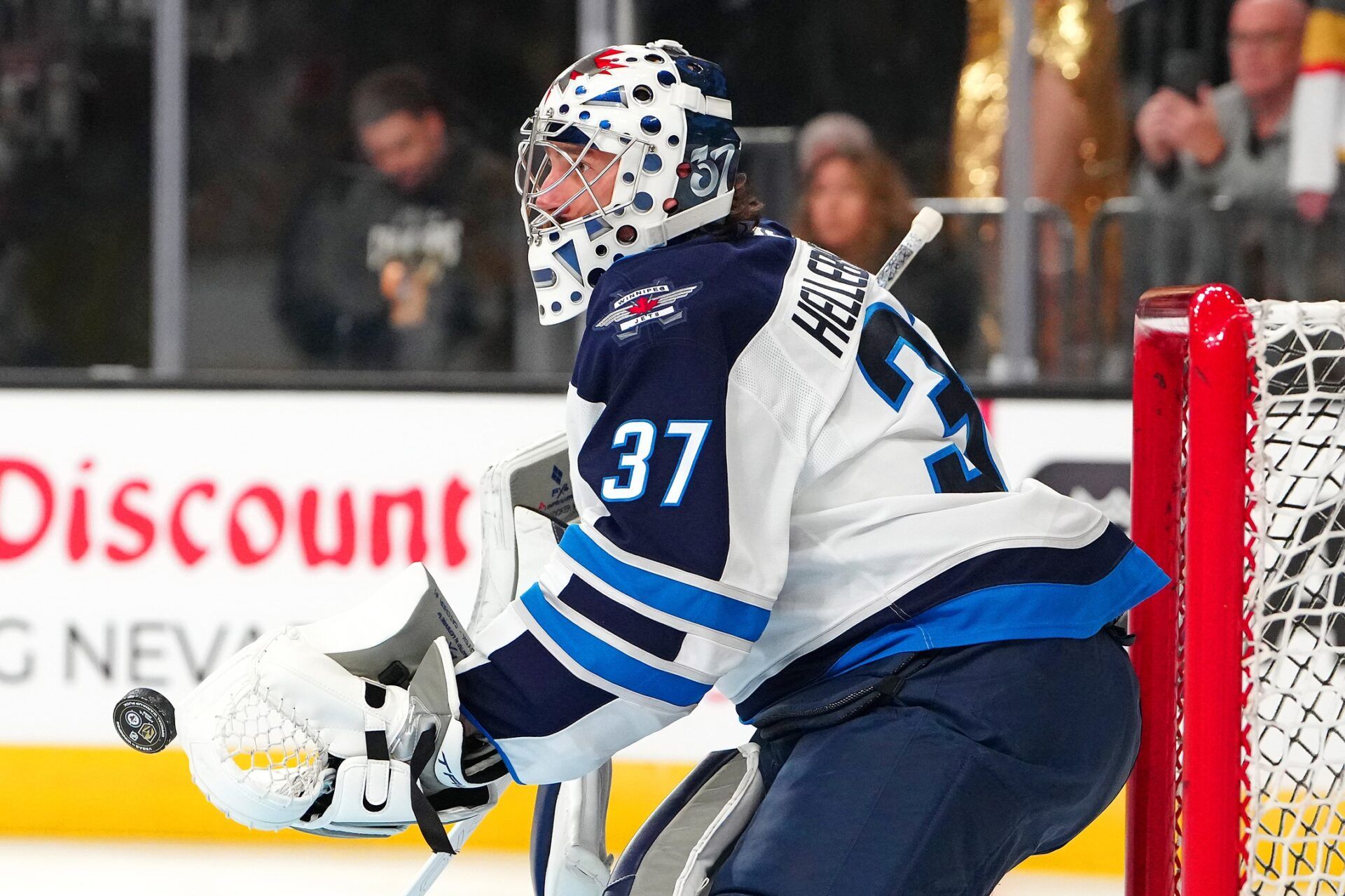 Winnipeg Jets goaltender Connor Hellebuyck (37) warms up before the start of a game against the Vegas Golden Knights at T-Mobile Arena.