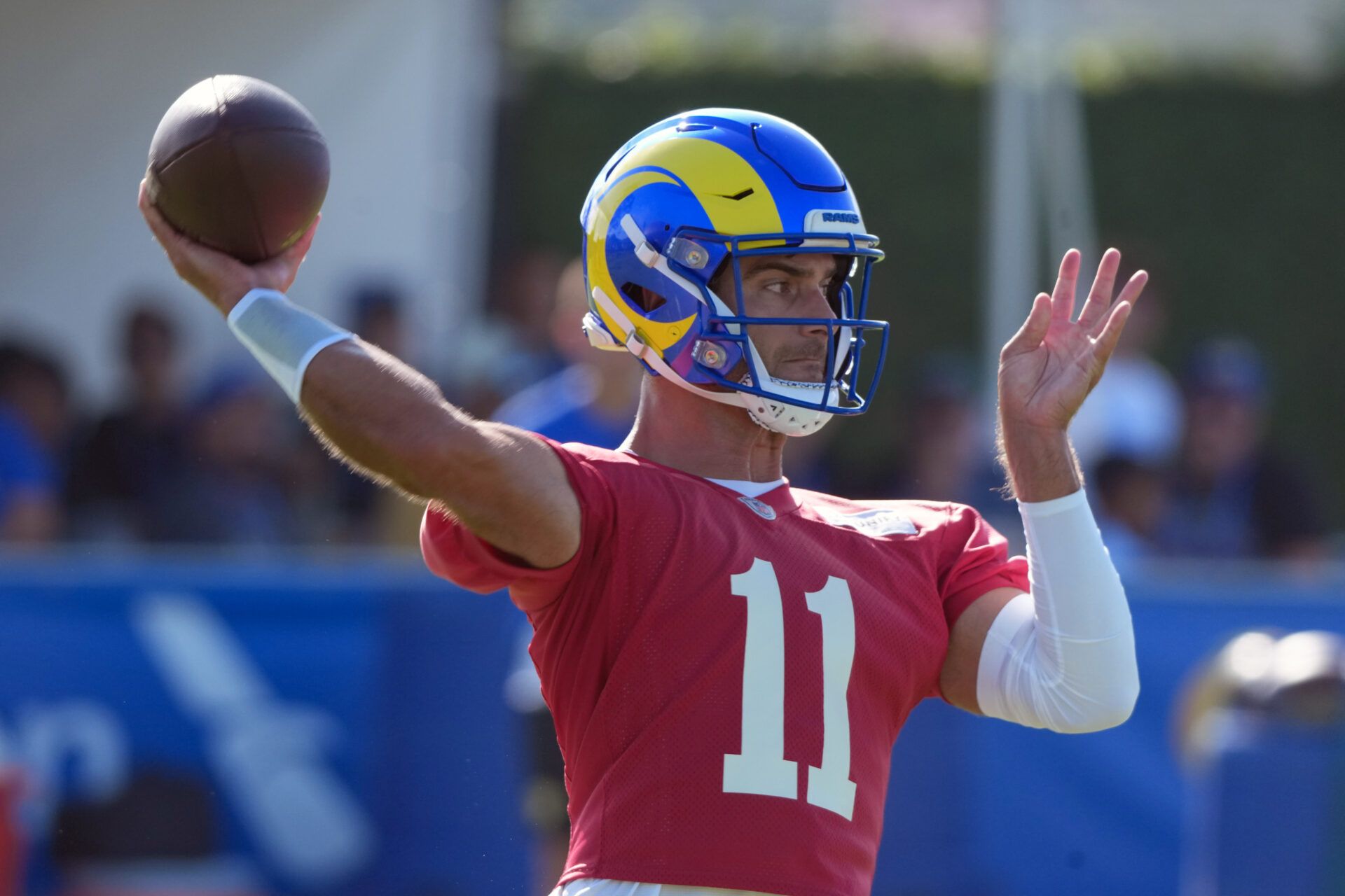 Los Angeles Rams quarterback Jimmy Garropolo (11) throws the ball during training camp at Loyola Marymount University.