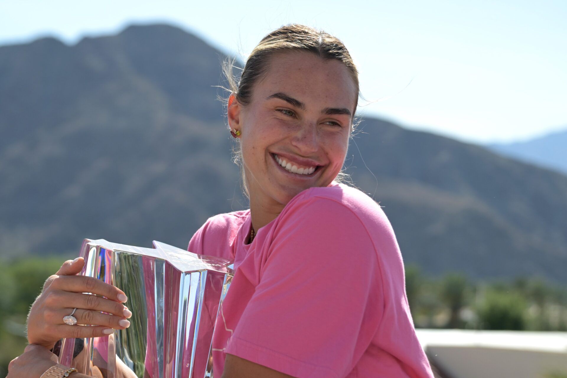 Aryna Sabalenka (BEL) holds the championship trophy after winning the womenÕs final of the BNP Paribas Open defeating Elena Rybakina (KAZ) at the Indian Wells Tennis Garden.
