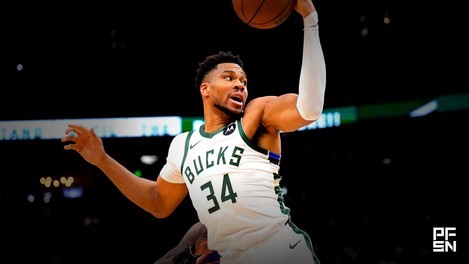 Milwaukee Bucks forward Giannis Antetokounmpo (34) holds the ball during the first quarter against the Phoenix Suns at Fiserv Forum.