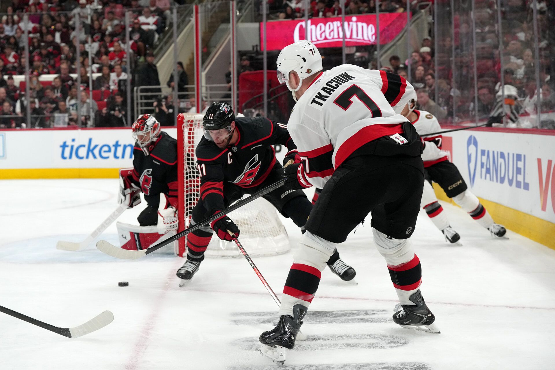 IOttawa Senators left wing Brady Tkachuk (7) gets the shot way against Carolina Hurricanes center Jordan Staal (11) and goaltender Frederik Andersen (31) during the second period n game two of the first round of the 2026 Stanley Cup Playoffs at Lenovo Center.