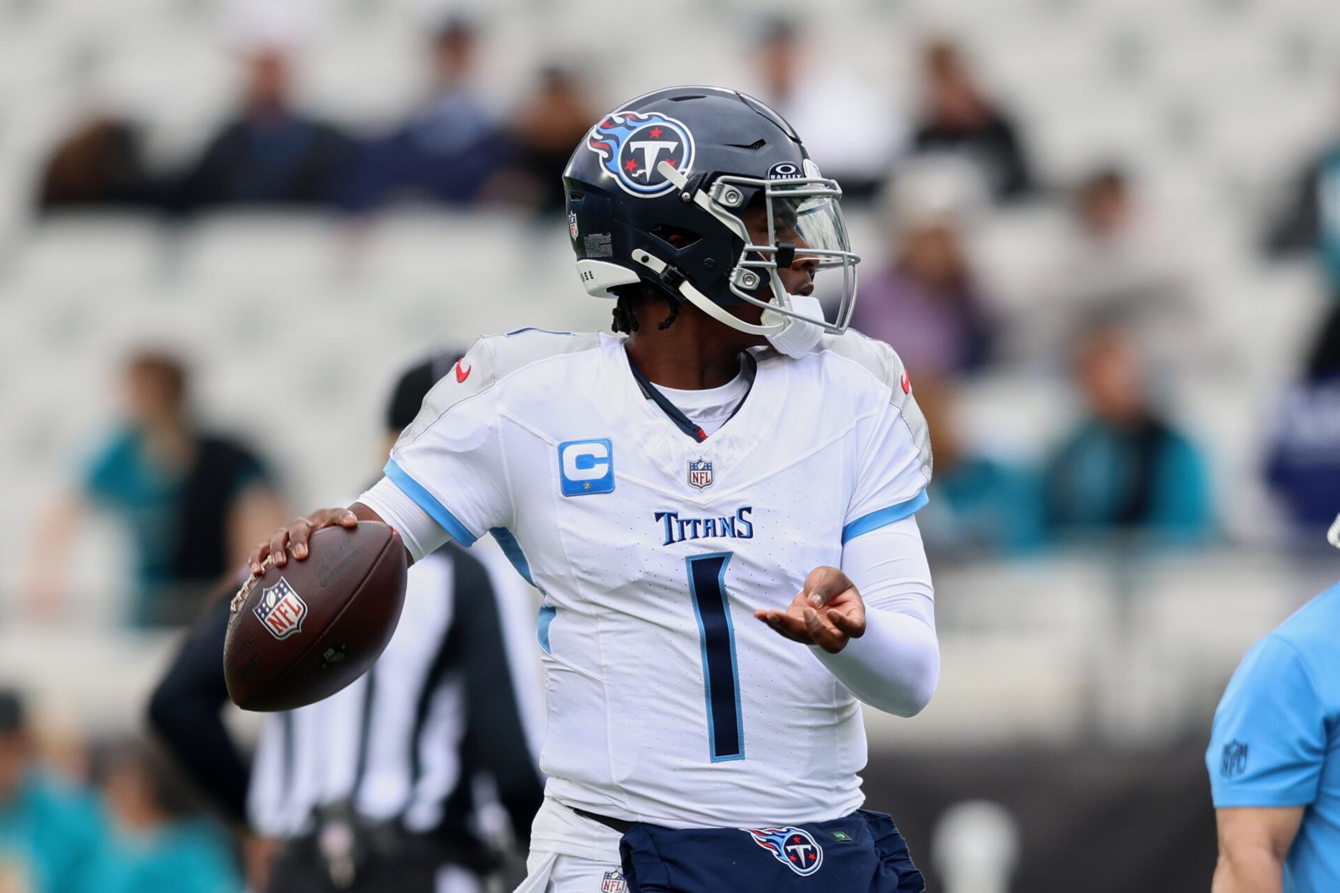 Tennessee Titans quarterback Cam Ward (1) throws a pass before the game against the Jacksonville Jaguars at EverBank Stadium.