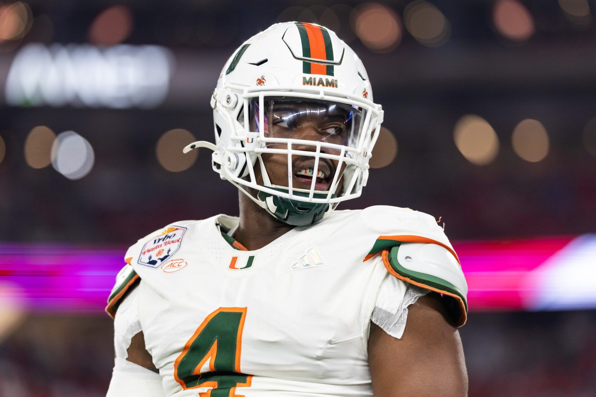 Miami Hurricanes defensive lineman Rueben Bain Jr. (4) against the Mississippi Rebels during the 2026 Fiesta Bowl and semifinal game of the College Football Playoff at State Farm Stadium.