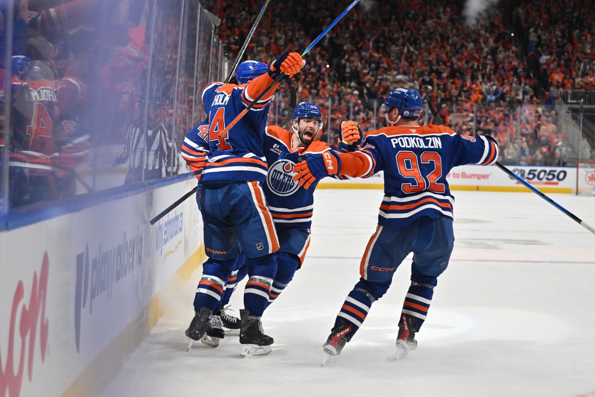 Edmonton Oilers defenseman Mattias Ekholm (14) and Oilers right winger Kasperi Kapanen (42) Oilers defenseman Jake Walman (96) and Oilers right winger Vasily Podkolzin (92) celebrate a goal on the Anaheim Ducks in game one of the first round of the 2026 Stanley Cup Playoffs during the third period at Rogers Place.